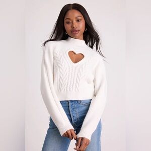 Priya Ivory Cutout Mock Neck Cropped Sweater
Lulus size small